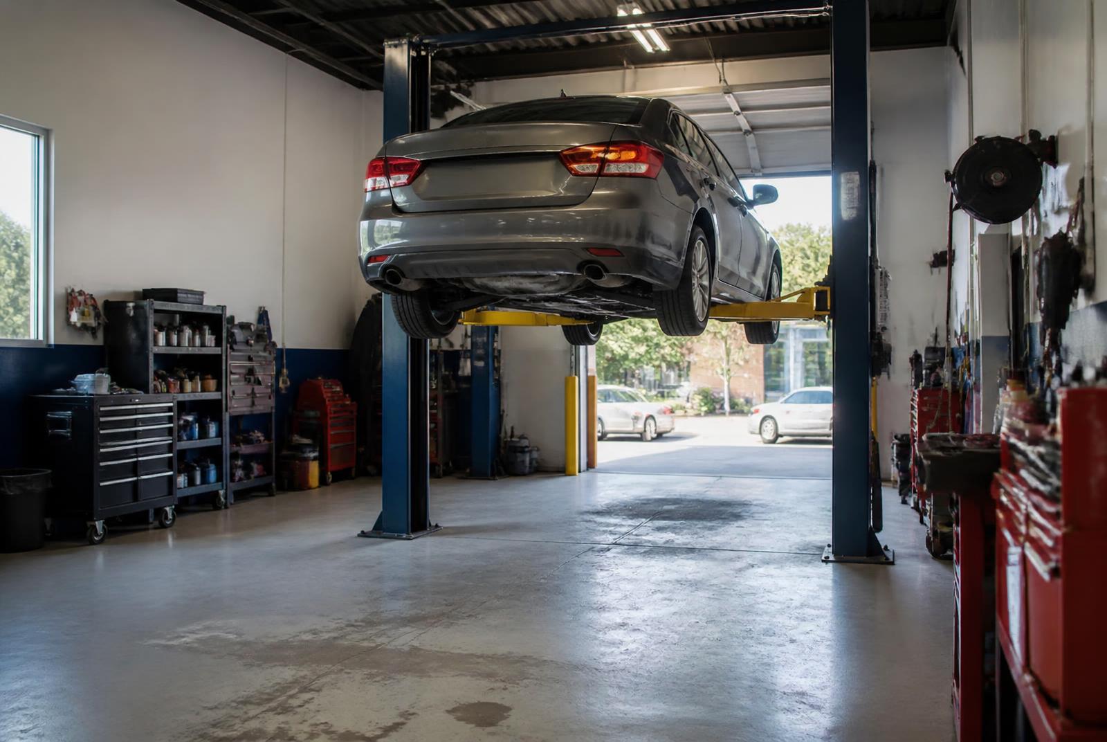 Service bay inside 4 Aces Auto Center on Parkhill Road East in Peterborough, Ontario